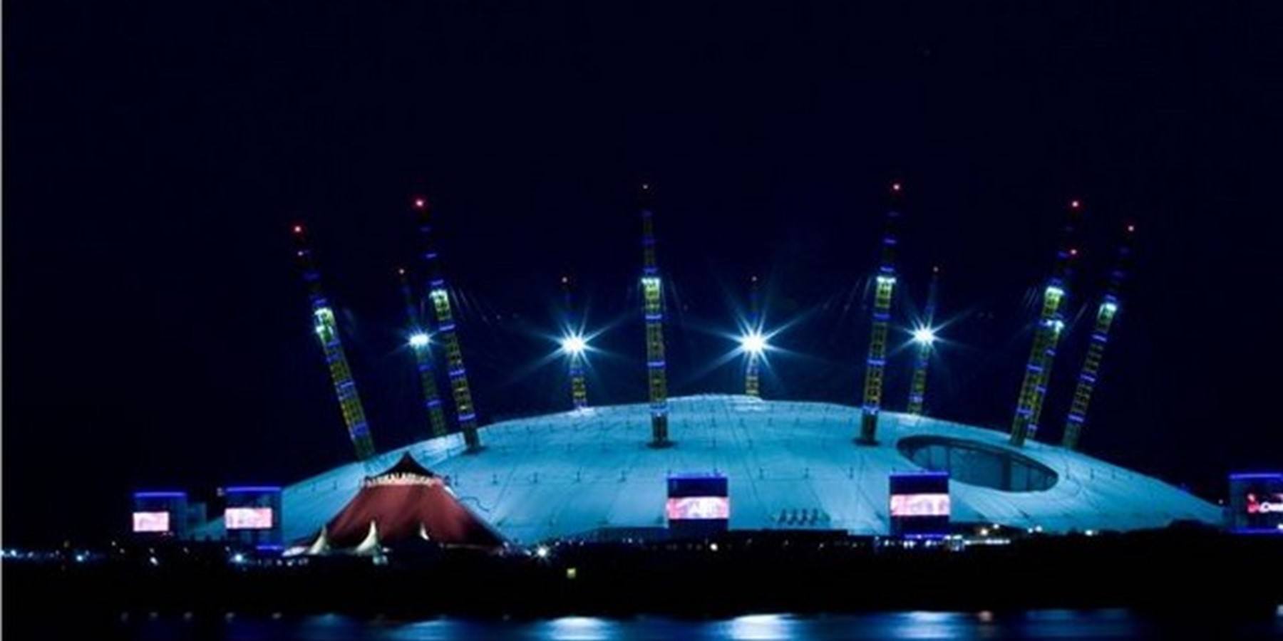 The 02 illuminated at night