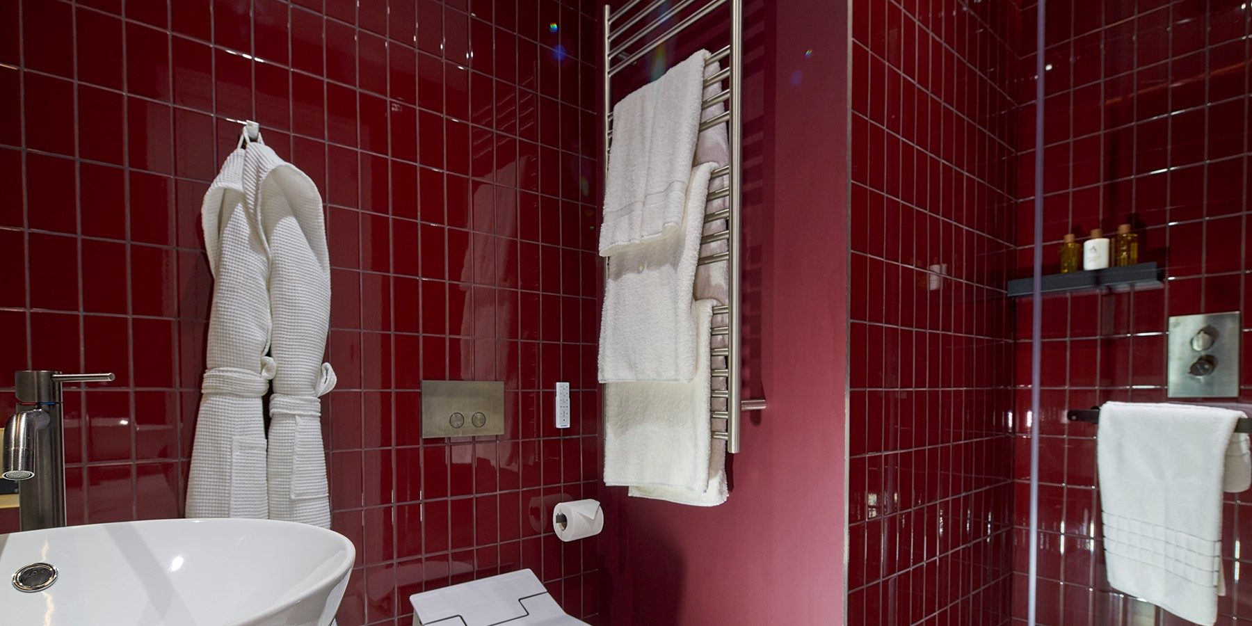 Lexham Gardens by Cheval Maison red tiled bathroom